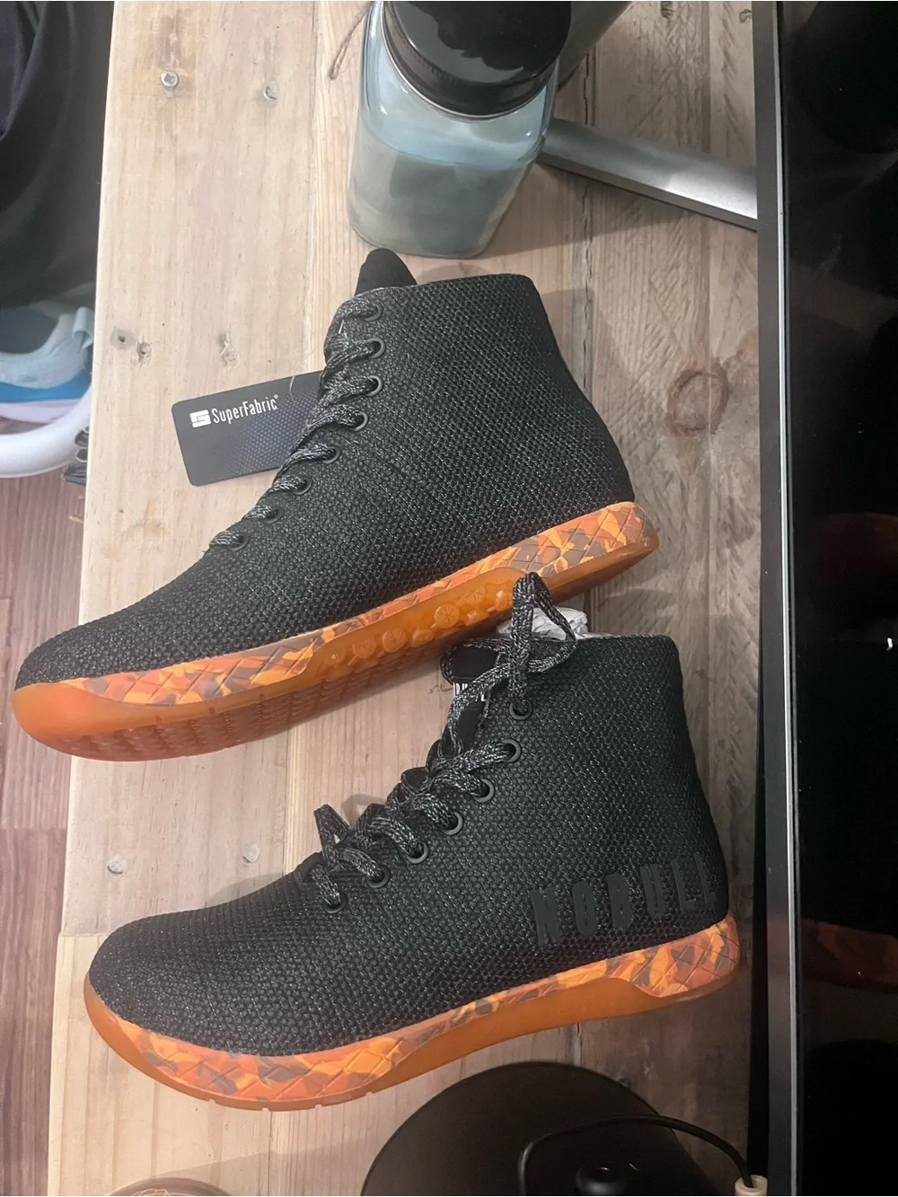 NOBULL Black Knit High-Top Trainers with Orange Sole